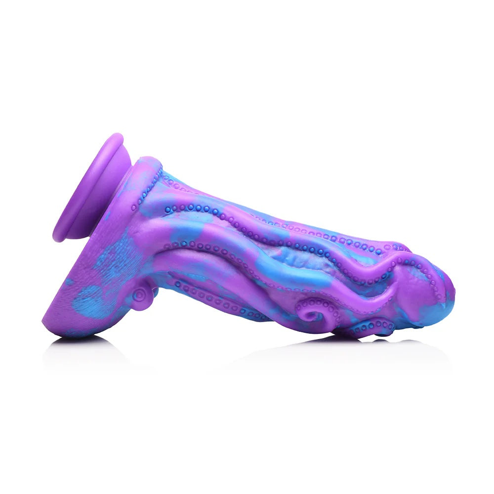 XR brands octophallus purple and blue tentacle wrapped phallus silicone dildo with suction cup laid horizontal side view