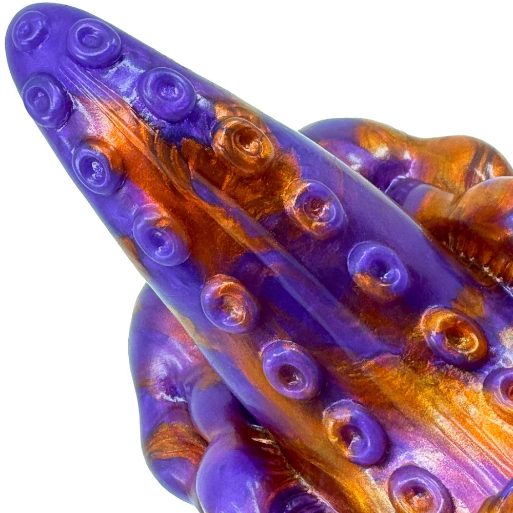 purple and copper silicone vibrating tentacled creature grinder