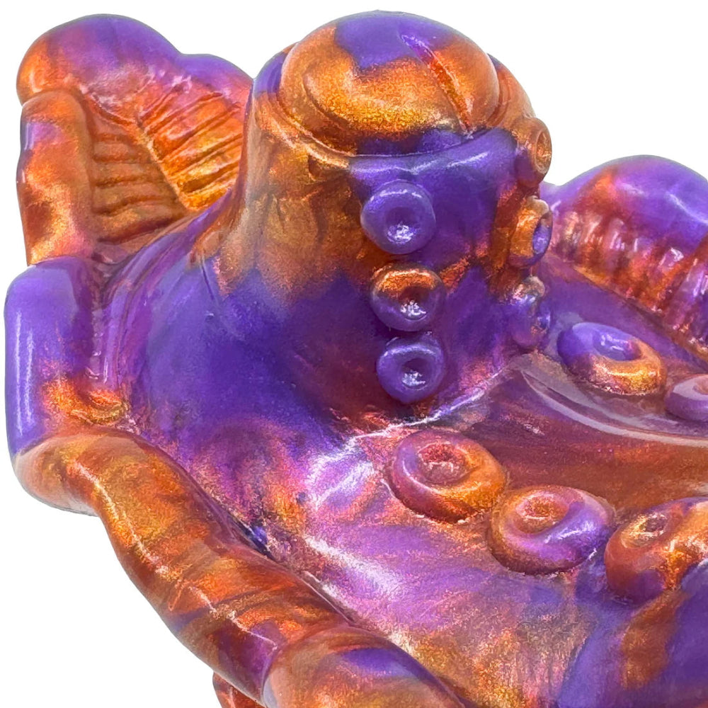 purple and copper silicone vibrating tentacled creature grinder