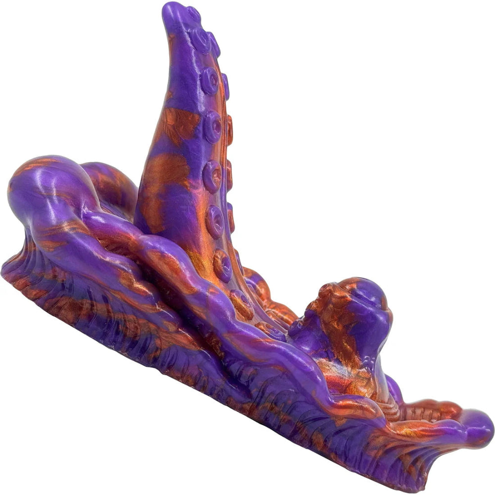 purple and copper silicone vibrating creature grinder
