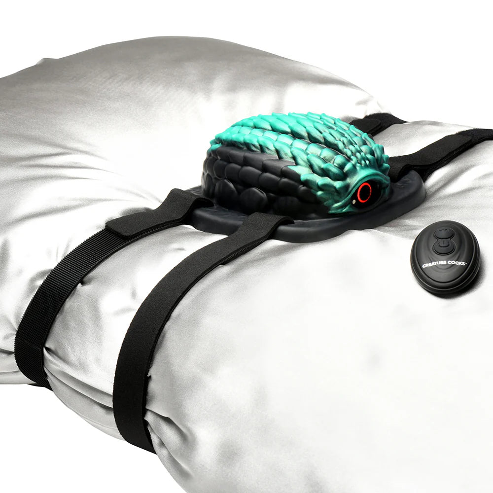 Dragon Vibrating Rechargeable Silicone Grinder Black/Teal with remote by creature cocks wrapped around pillow