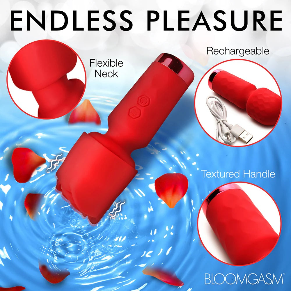 Red Pleasure Rose Mini Wand , with silicone rose cover on wand in a pool of water