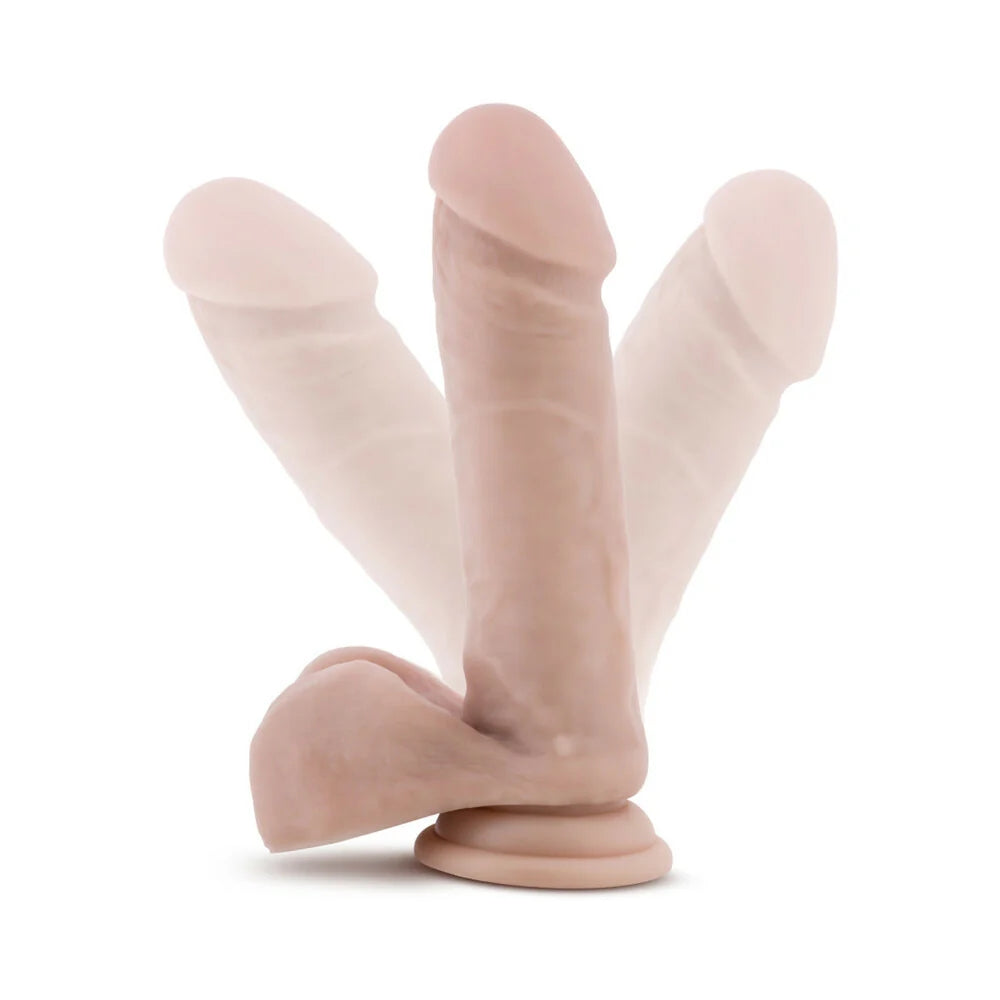 Au Naturel Vanilla Sensafeel TPE dildo with balls and suction cup base side, with flexibility indicators