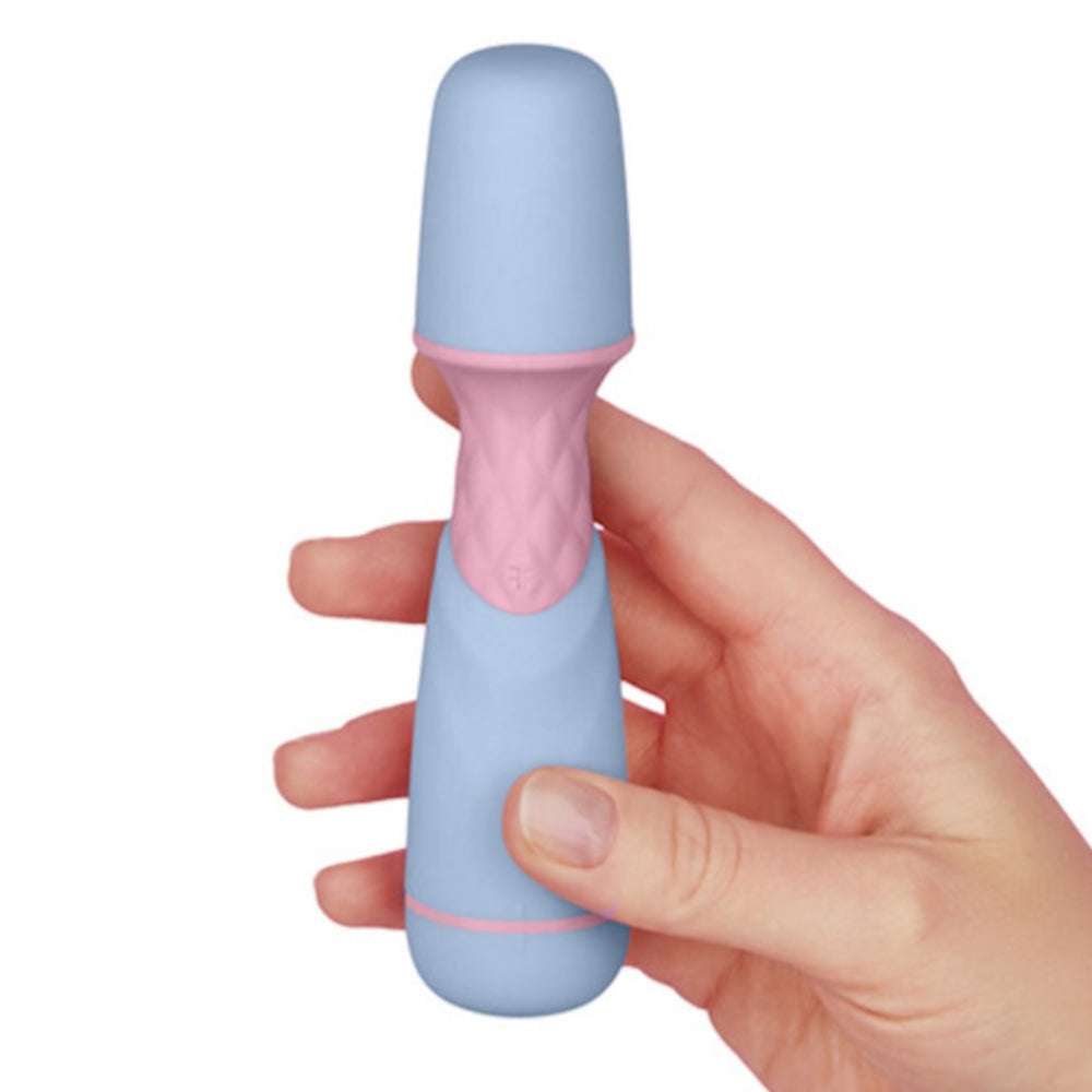 FemmeFun FFIX Mini Battery operated wand vibrator in blue in a hand