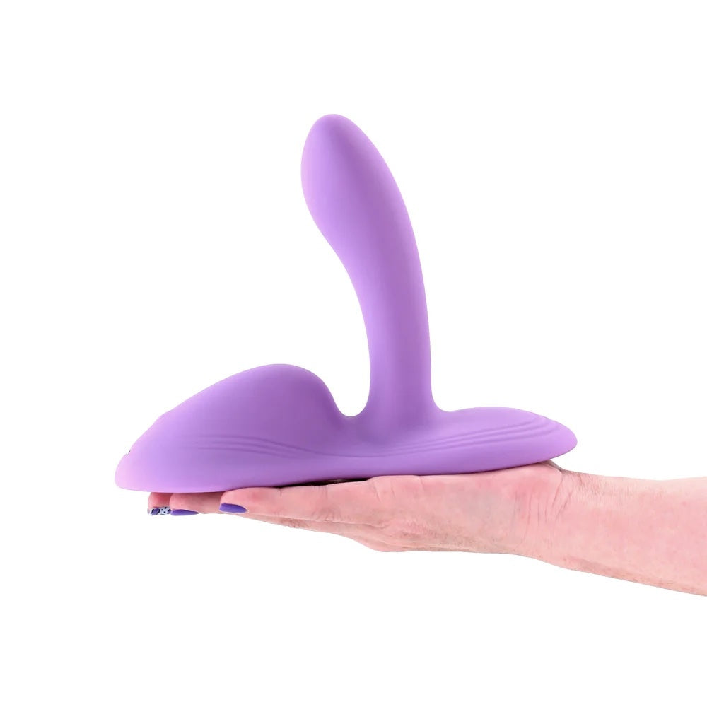 NS Grinders Paramour g-spot grinder pad from the side in the pal of a hand