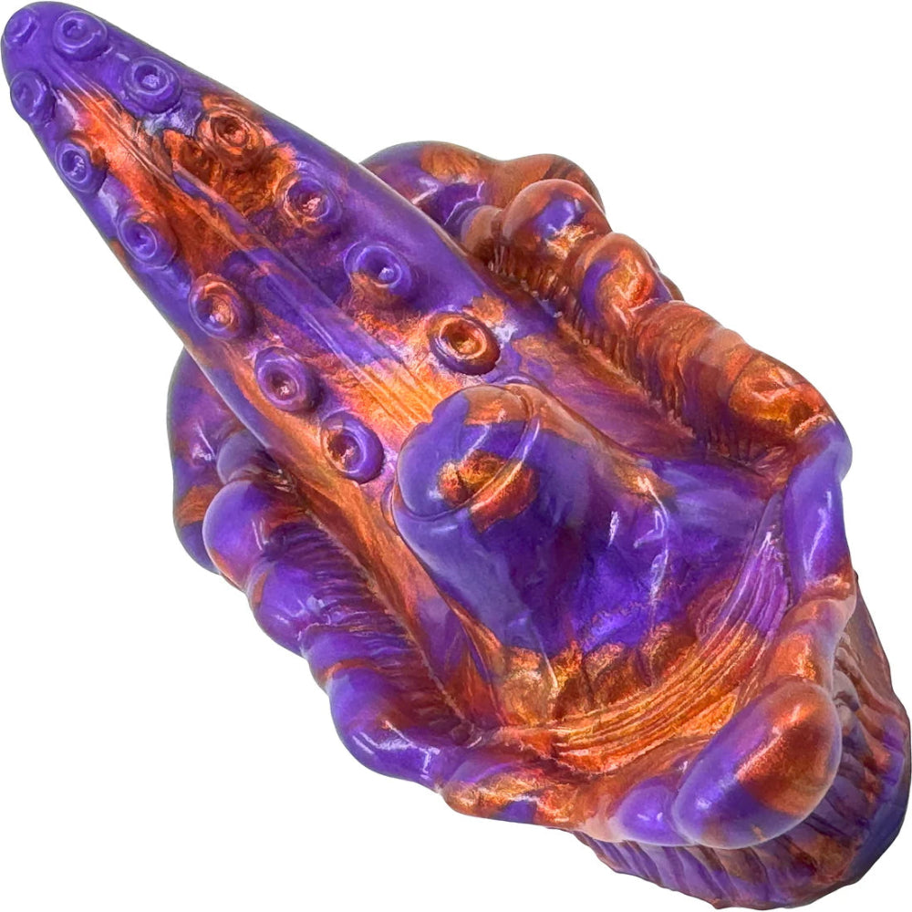 purple and copper silicone vibrating creature grinder