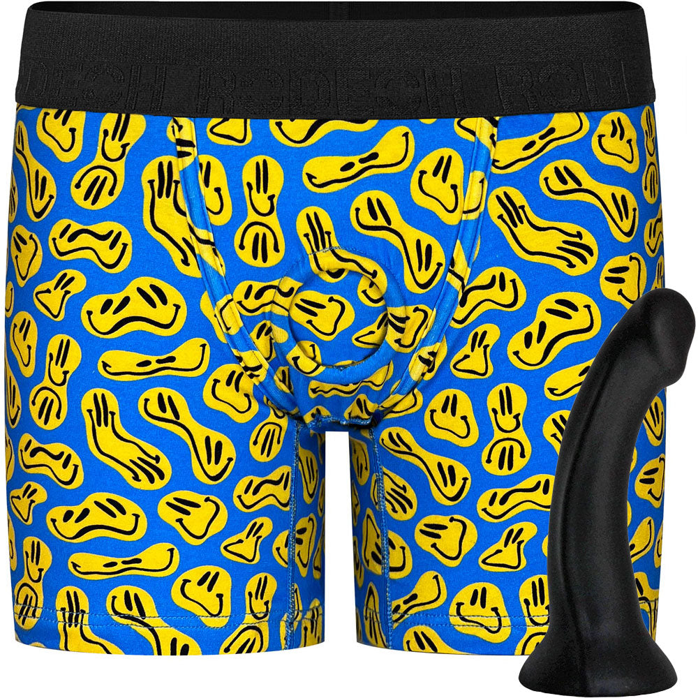 Black Contour silicone dildo from the side, shown with Classic Rise Boxer smiley print harness option from the front