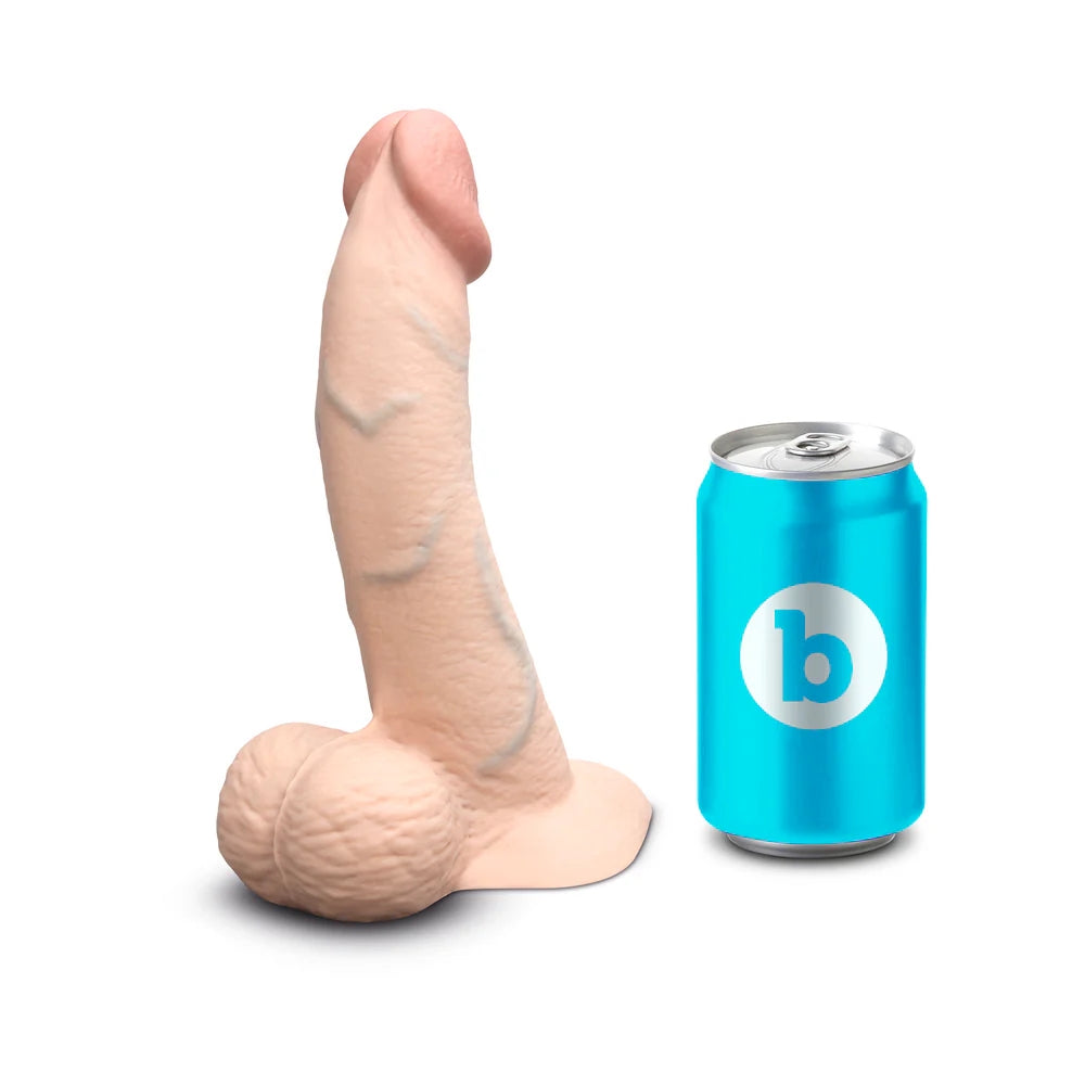 Slipskin curvy sliding skin silicone dildo in cream, next to a standard soft drink can for size comparision