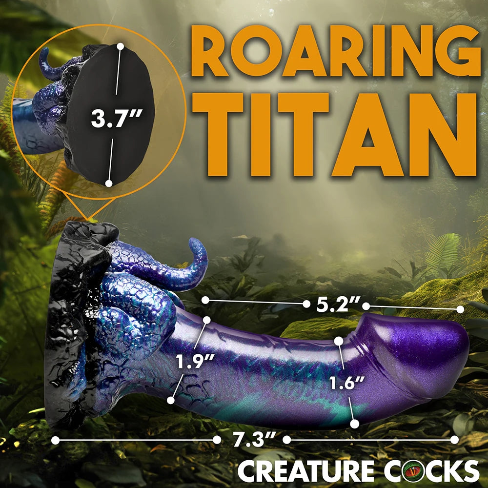 XR creature Cocks Dino Dick dinosaur fantasy dong with mini tail and legs in purple, black and teal laying horizintal to the ground with the dimensions of didldo