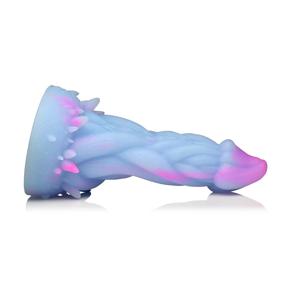 XR Brands Creature Cocks Nomura Jellyfish shaped, pink, purple and blue fantasy silicone dildo horizontal to the ground