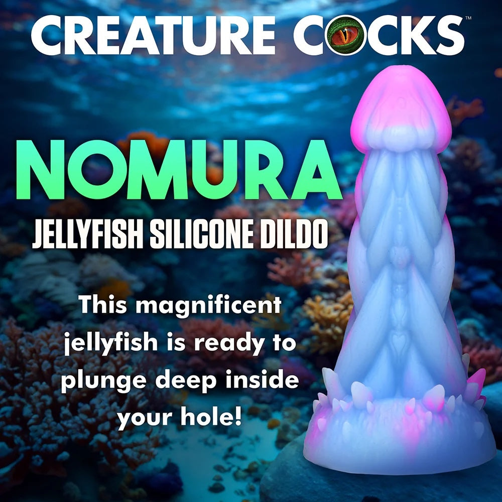 XR Brands Creature Cocks Nomura Jellyfish shaped, pink, purple and blue fantasy silicone dildo in seacape with graphic text of the name