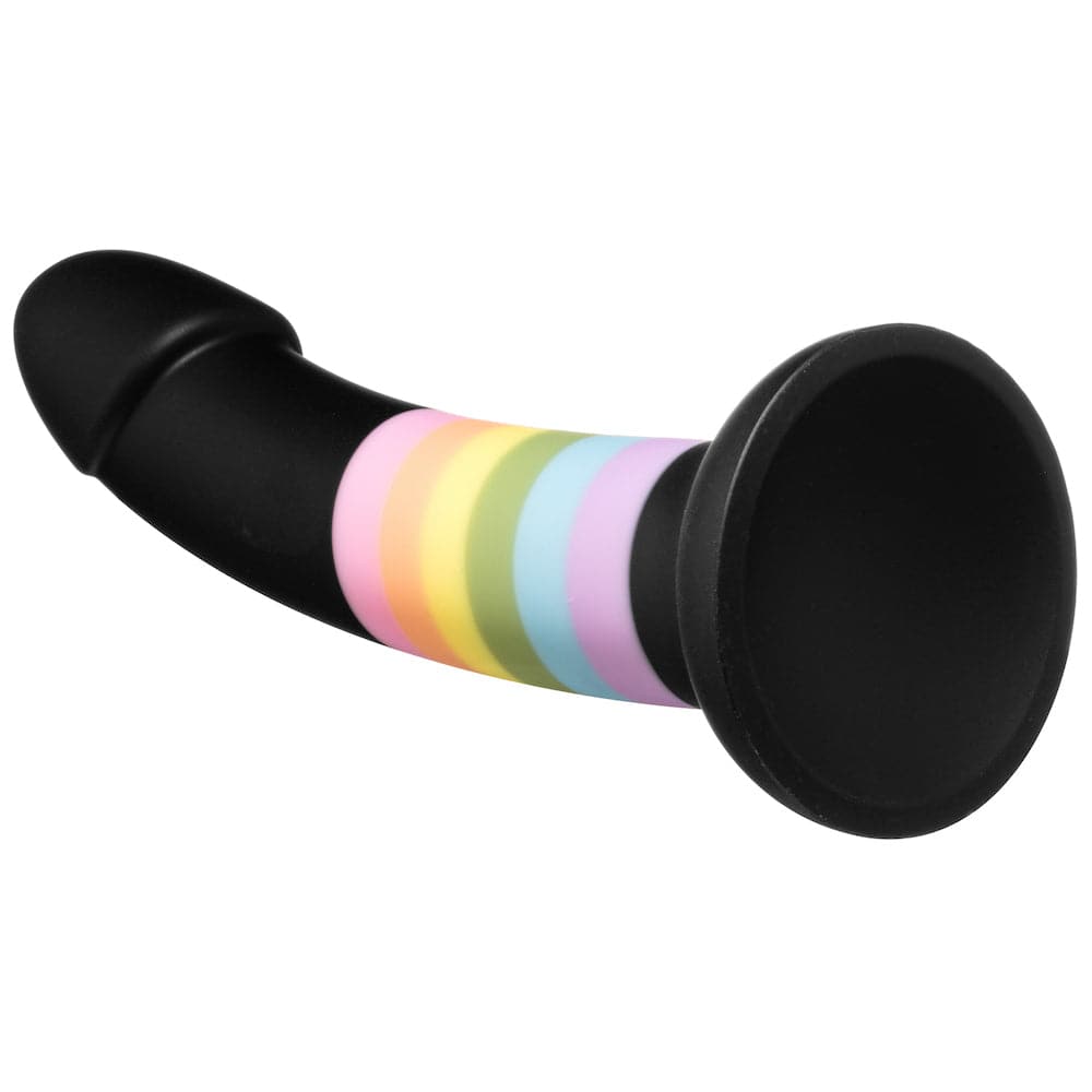 black dildo with rainbow stripe and suction cup bottom, laid on its side to expose suction base