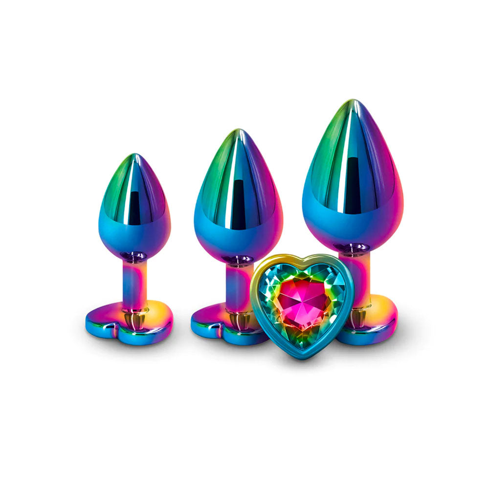 Three-piece anal plug set in iridescent rainbow chrome with heart-shaped jewel bases, small medium and large