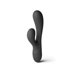 A matte black dual-stimulation personal massager with a cactus-like curved design, shown standing upright on a clean white background.