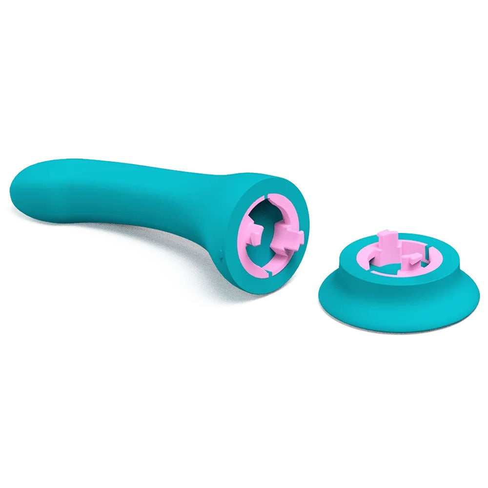 Banana Split customizable couples strapless strap on vibrator banana, with it's included suction base to use as a stand alone vibrator,  disconnected,  with interior locking mechanism exposed