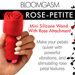 Red Pleasure Rose Mini Wand , with silicone rose cover on, and held in a hand with graphic text of the features