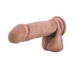 Au Naturel 6.25 Dual Density Caramel Sensafeel dildo with balls and suction horizontal to the ground