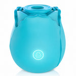 nexus Vibe PetalPulse silicone air pulse rose clitoral stimulator on its base form the side with power button lit up