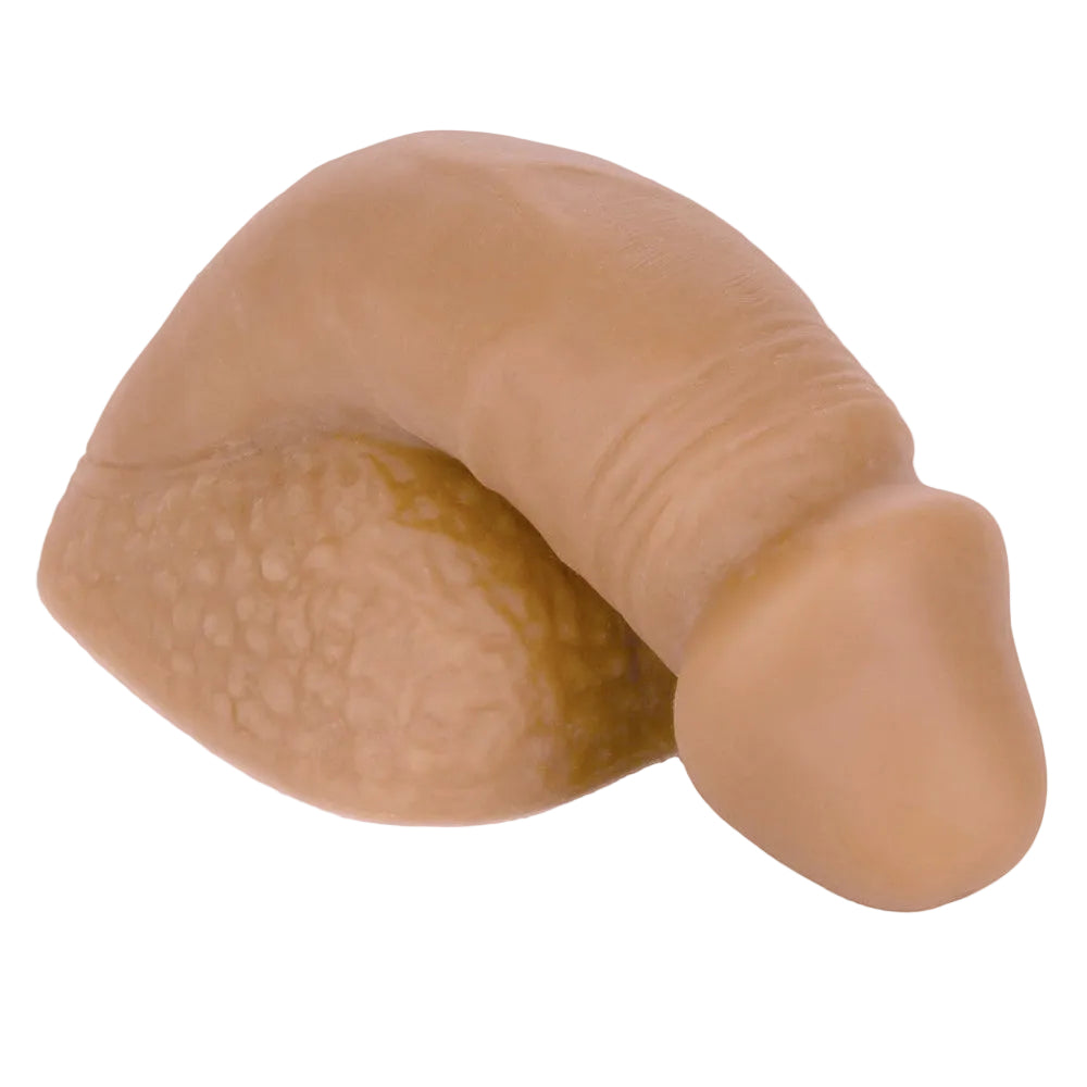 caramel colored silicone 4 inch packer gear soft penis packer, flat on the base folded