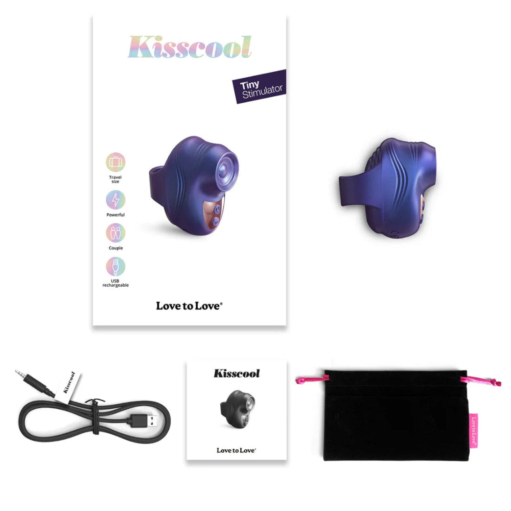 Love to love kisscool Indigo purple tapping finger vibrator from the side, laid out with the packaging as well as the instruction booklet, included charging cord, and travel storage pouch