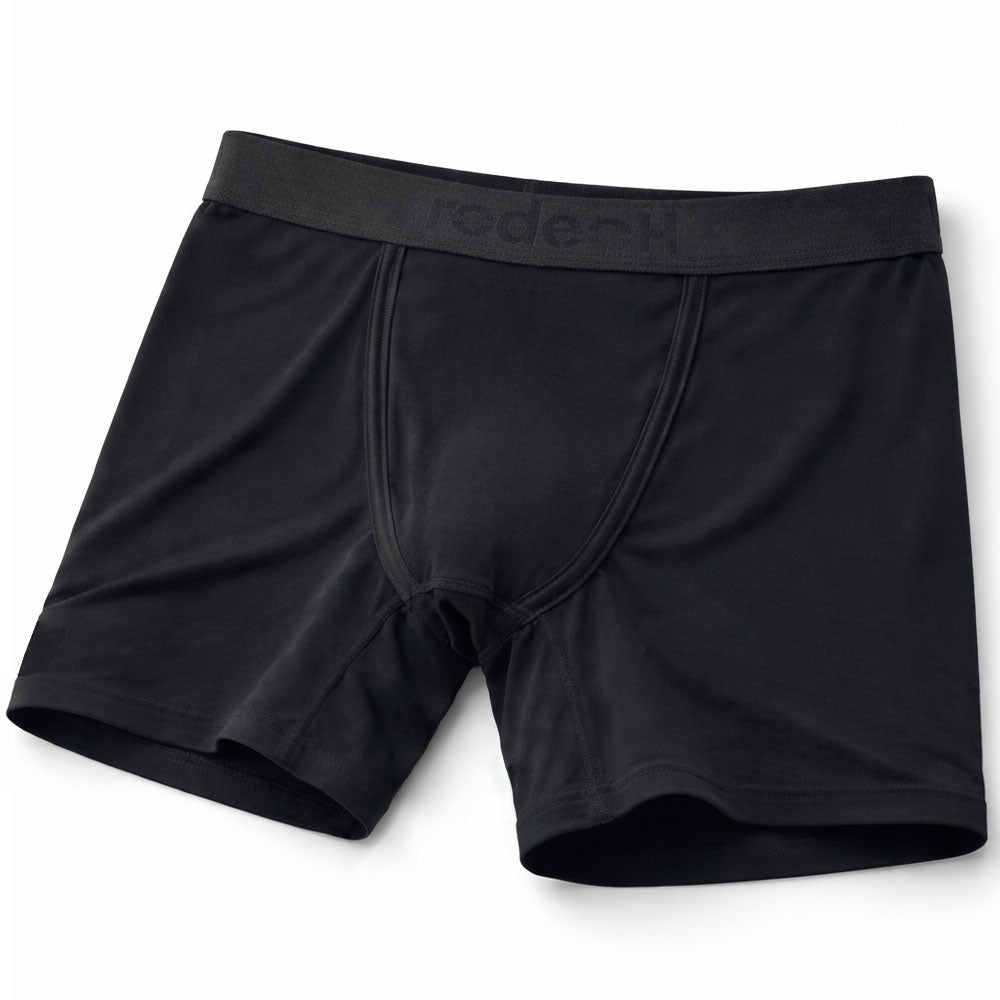 Black boxer briefs with a rodeoh label on a white background
