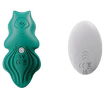 Green Flutter silicone remote control panty vibe from the back to show power button and charging port, with remote from the back to show battery area