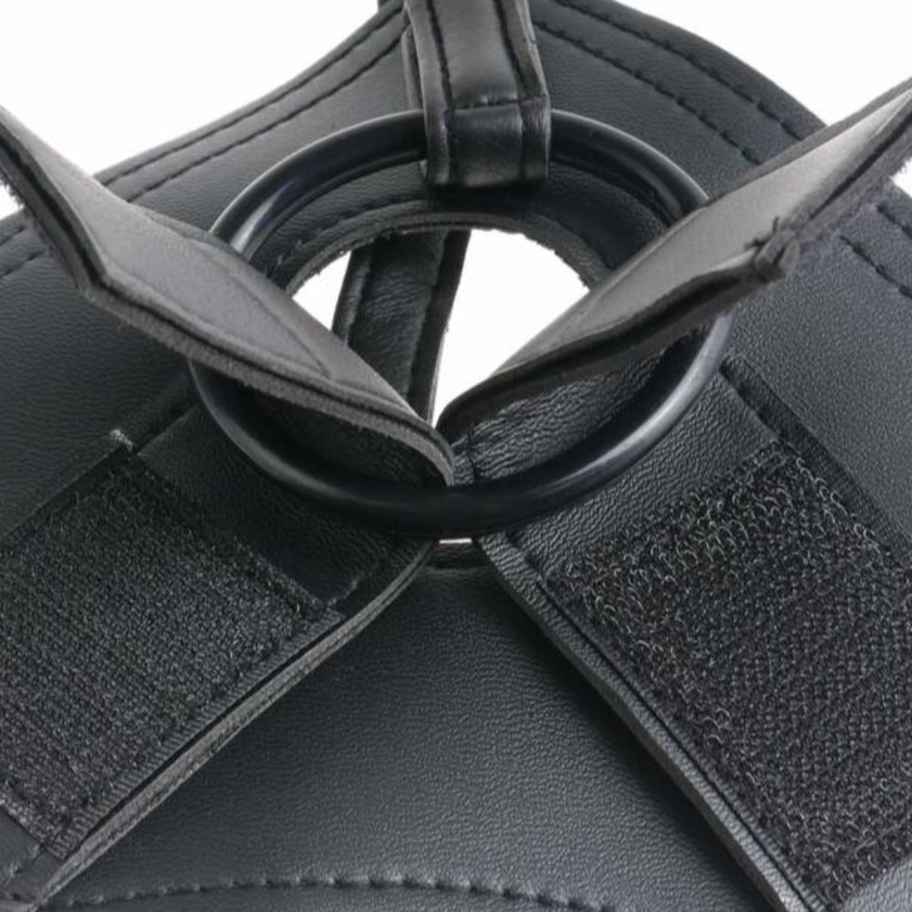King cock vinyl black harness, zoomed into velcro straps that hold orings in place