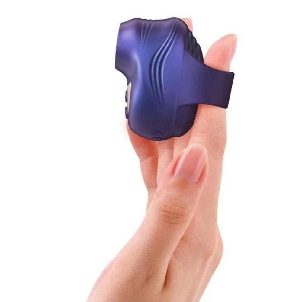 Love to love kisscool Indigo purple tapping finger vibrator from the side slid over a pointer finger
