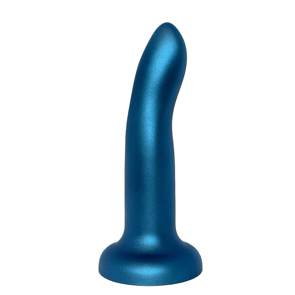 Nexus 6 inch rory silicone dildo in midnight blue metallic, sitting flat on its suction base with g spot curve facing the viewer's right