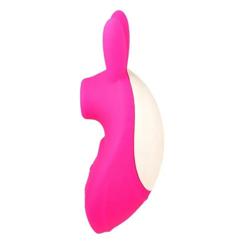 pink silicone bunny  shaped clitoral vibrator with licking tongue and vibrating ears from the side