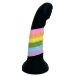 Nexus Silicone Tease ribbed dildo in black with rainbow stripes from the side, flat on its suction base. 
