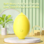 Nexus vibes lemon pucker sucking yellow silicone lemon shaped vibrator, sitting on its opening, against a green background