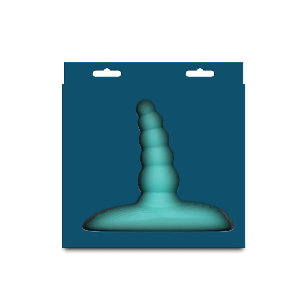 NS Grinders Sublime beaded silicone dual stimulation grinder pad from the side inside its packaging