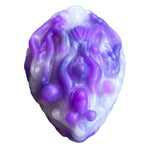 Pris toys tribble silicone fantasy grinder dildo cushion in amethyst, a swirls of 3 shades of purple, from the front close up to note texture