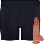 RodeoH Black Button fly boxer harness flat from the front with  caramel color of 6" Slyder dildo shown from the side