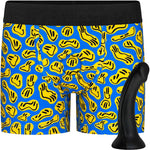 Black Contour silicone dildo from the side, shown with Classic Boxer smiley print harness option from the front