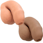 Nexus silicone foreman, uncut silicone packers in caramel and vanilla, in flaccid position from the front