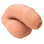 Nexus silicone foreman, uncut silicone packers in caramel and vanilla, in flaccid position from the front and side 3 quarters view with balls exposed