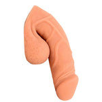 Freeform Medium 5 inch silicone soft  ftm packer, in Warm Rosy colors from the side in the flaccid packed position
