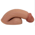 CARAMEL SILICONE VECTOR 5 INCH FTM SILICONE PACKER, FROM THE SIDE IN THE PACKED FLACCID POSITION, FLAT ON ITS BASE