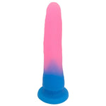 Nexus Grande Dildo in Melon Glitter, pink and blue flat on it's suction base from the back