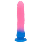 Nexus Grande Dildo in Melon Glitter, pink and blue flat on it's suction base from the front