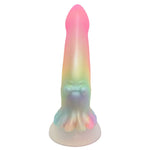 Nexus Silicone fantasy squid dildo in rainbow shimmer flat on its suction base from the back with the squid looking out