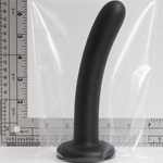 Black silicone adult novelty item in a clear plastic bag with ruler markings showing dimensions, on a white background.