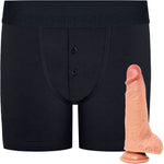 RodeoH Black Button fly boxer harness flat from the front with vanilla color of 6" Slyder dildo shown from the side