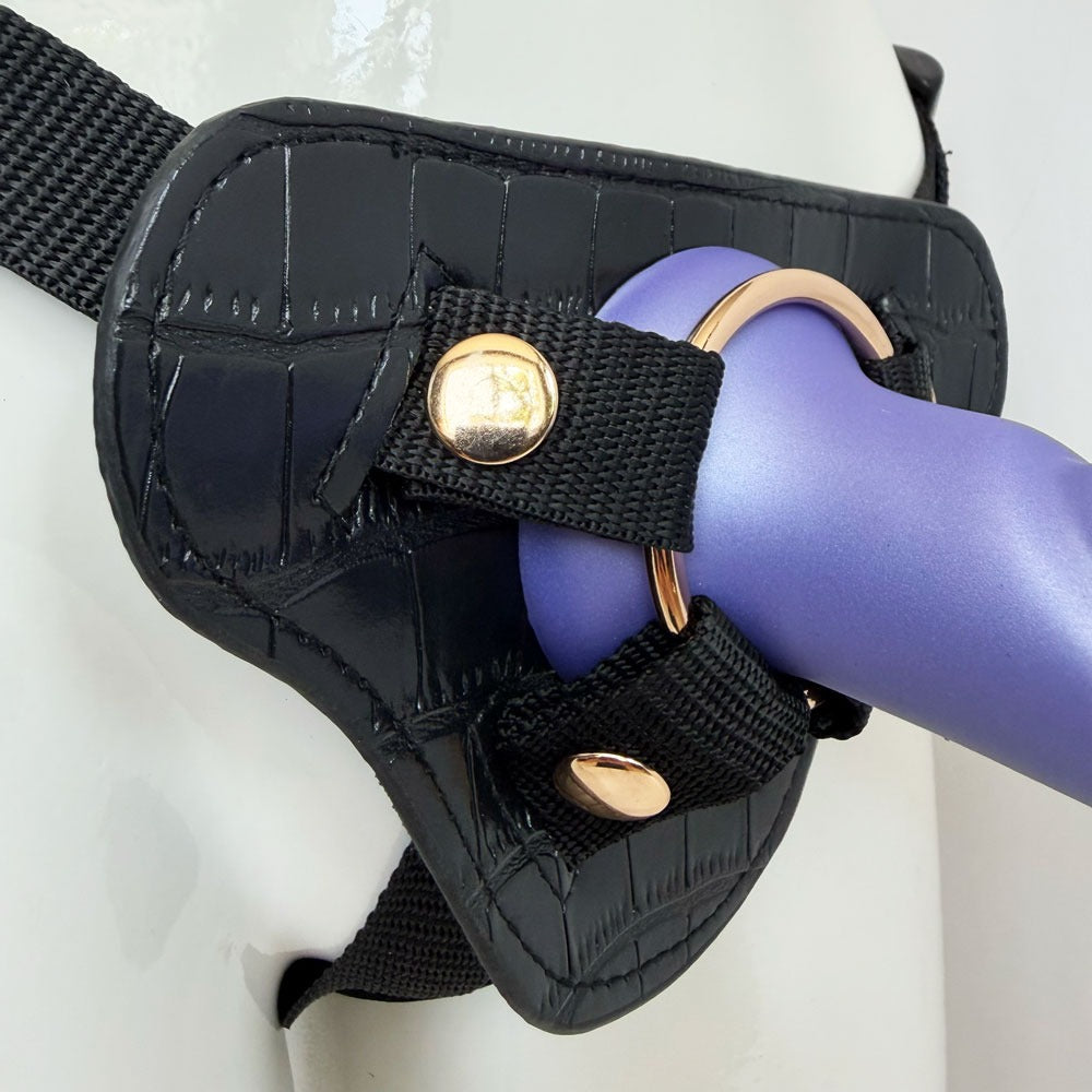 Nexus silicone  fun and love harness and silicone dildo set, with purple tease inserted zoomed in to show the gold hardware