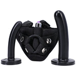 Black Bend over Beginners strap on kit with 2 black silicone dildos standing on the flat base of the dildos, with the black velvet finish harness