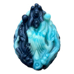 Pris Toys Tribble fantasy silicone dildo cushion with vibe hole from the front in Night tide, a blend of blues