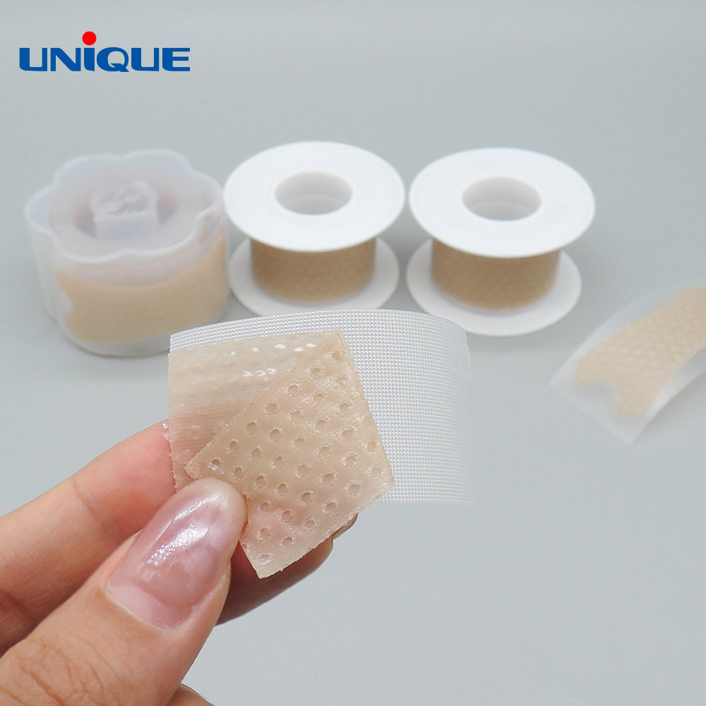 silicone scar tape by unnique, cut into a small piece and being peeled off backing