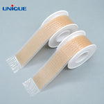 Unique silicone scar care tape, two rolls on gray back ground